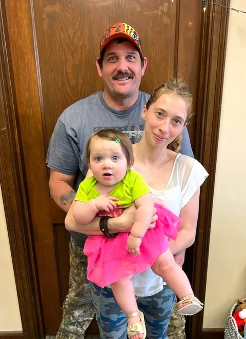 Kat with her partner Tim and their daughter Pauline